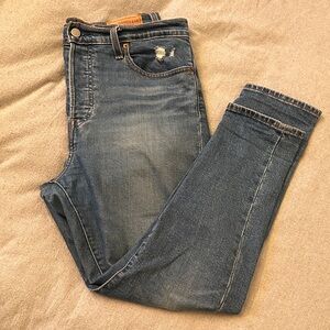 Distressed Blue Jeans